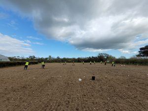 Sowing new experimental plots for a PhD student.